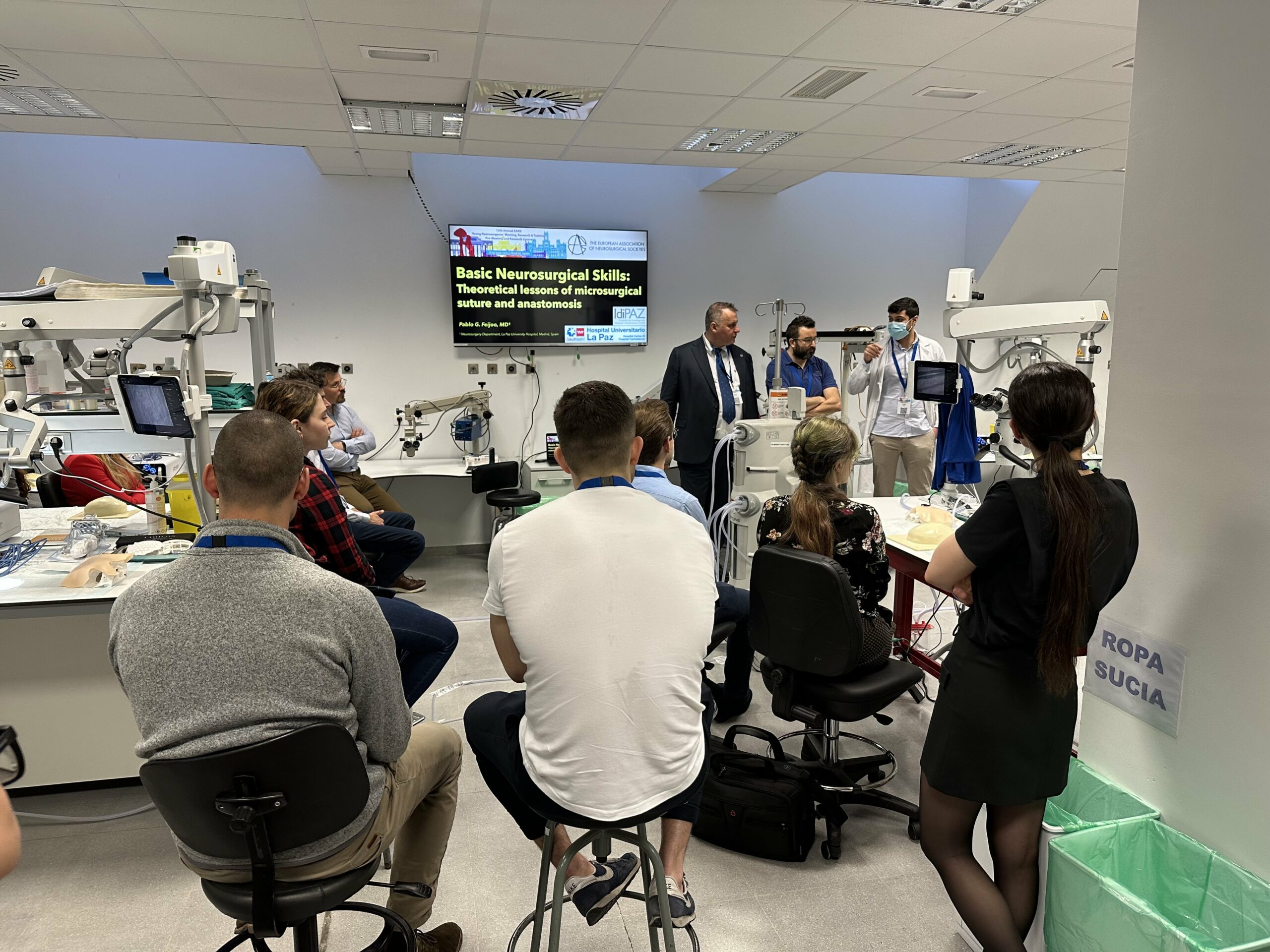 Welcoming participants to the Microsurgical Lab and Course.